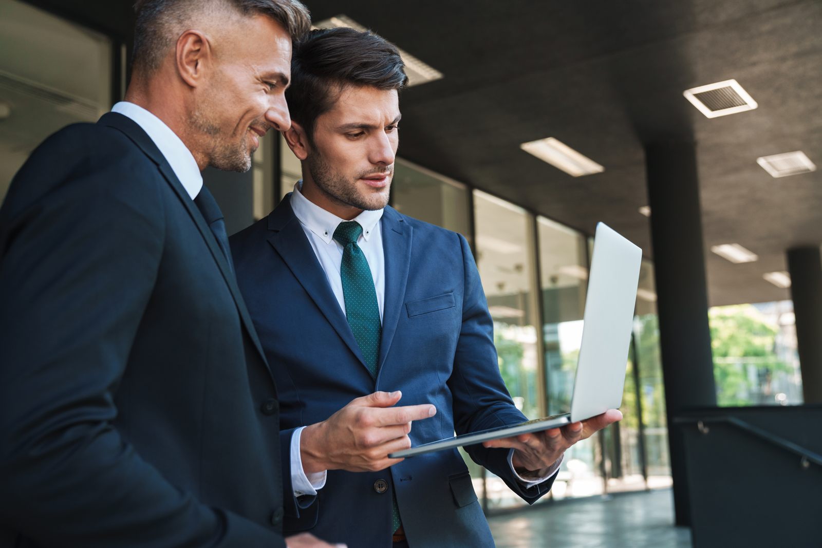 A fractional CFO reviewing forecasts with company leadership